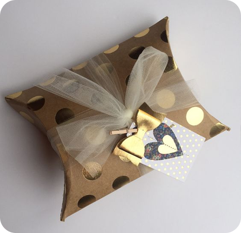 4 pillow boxes with gold foil